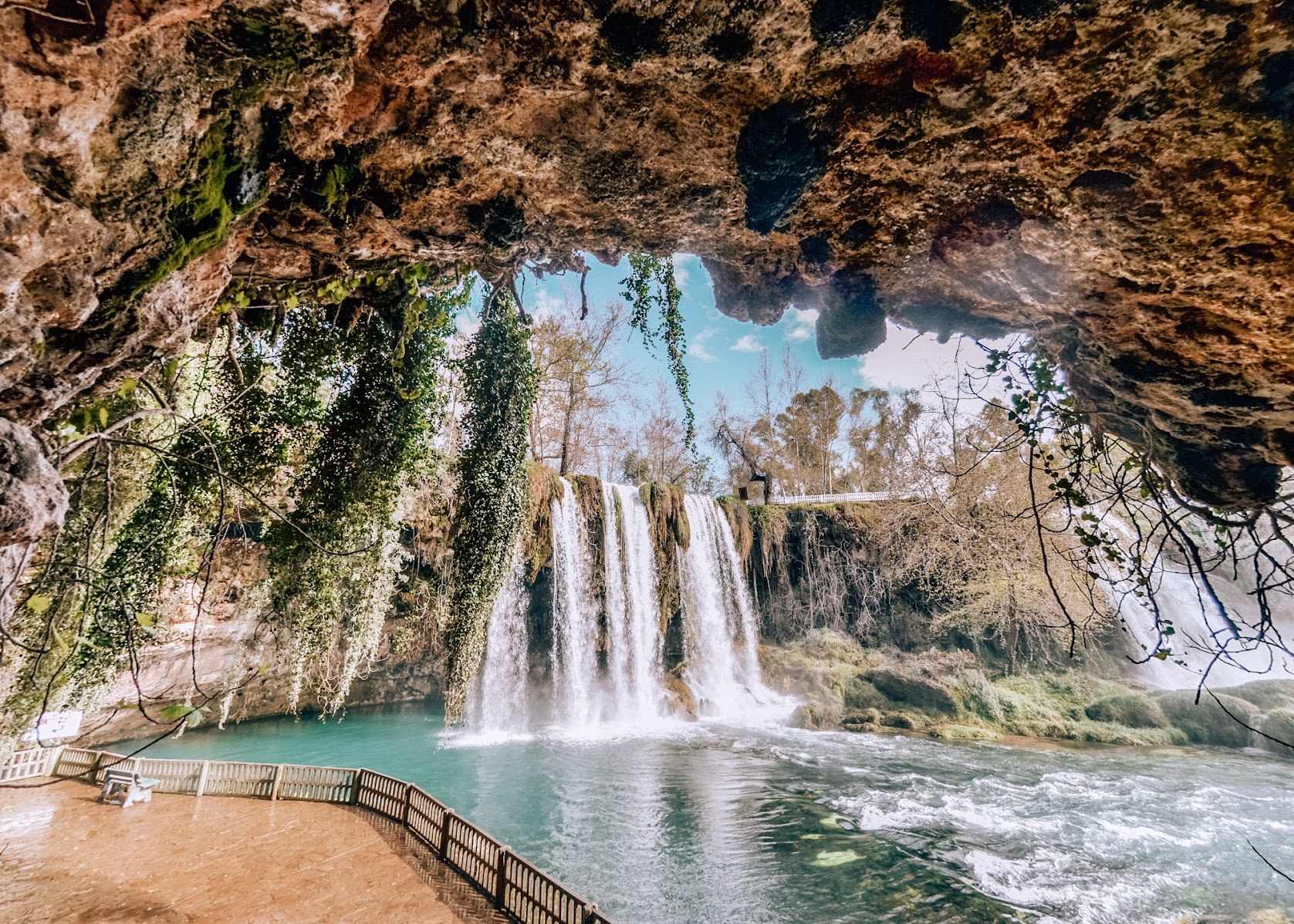 Looking out from inside the cave behind Upper Düden Waterfall onto the falls and pool below